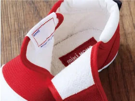 Soft lining and padded opening inside a red MIKI HOUSE shoe