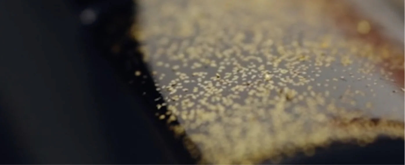 Fine decorative flecks applied to dark Wajima lacquerware